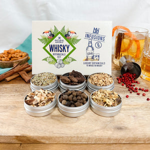Natural & Noble DIY Whisky Kit Next to Botanicals and Infused Whisky