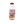 Clear bottle with wooden cap containing dried herbs on a white background
