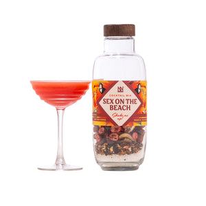 Natural & Noble Sex On The Beach Cocktail Kit Alongside The Made Cocktail Served In a Coupe Glass