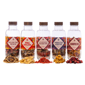 Five bottles of cocktail mix with colourful labels and ingredients on a white background
